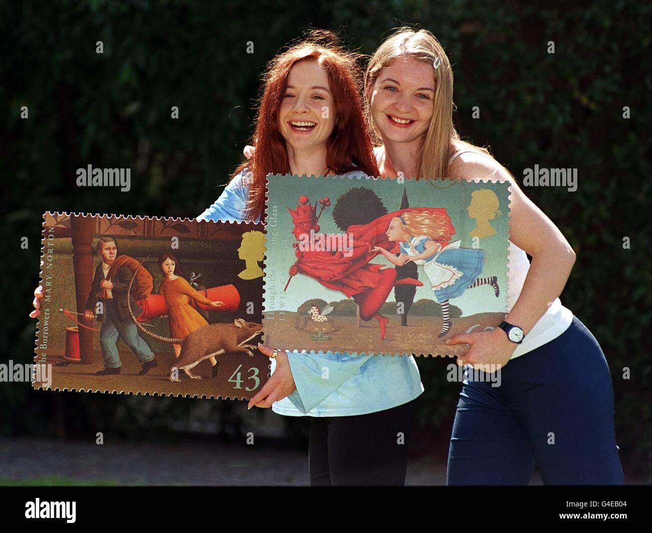 Actresses Rebecca Callard (left) and Victoria Donovan during a photocall in London today (Monday) where they launch the Royal Mail's 'Magical Worlds' stamps, which feature illistrations from children's books. Classic fantasy tales from JRR Tolkien to E Nesbit are featured in the collection of five stamps, which remembers the 100th anniversary of both CS Lewis's birth and Lewis Carroll's death. Photo by Michael Stephens/PA. Watch for PA story Stock Photo