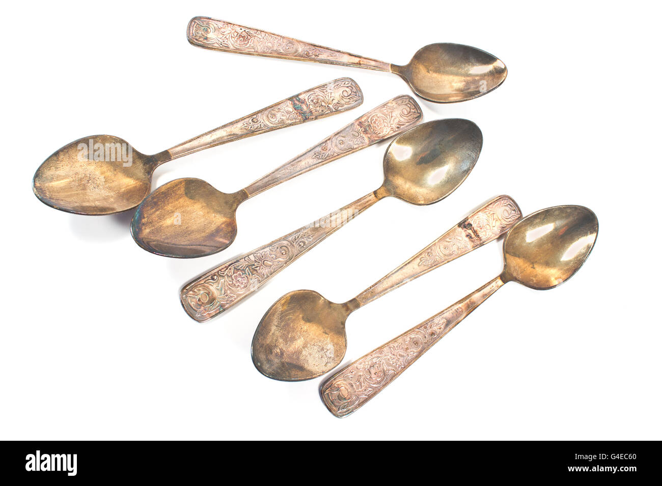 Vintage silver tea spoons isolated on white Stock Photo