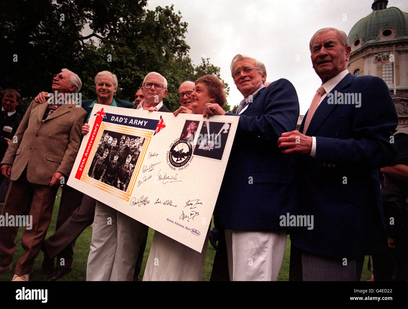 To mark the 30th anniversary of the first broadcast of the vintage comedy show Dad's Army actors and writers (L-R) Clive Dunn, Ian Lavender, David Croft, Frank Williams, Pamela Cundell, Jimmy Perry and Bill Pertwee join a reunion at the Imperial War Museum to coincide with the release of new audio tapes, BBC2's first series repeat today (Friday) and the release of a signed Dad's Army first-day cover. Photo by Matthew Fearn/PA Stock Photo