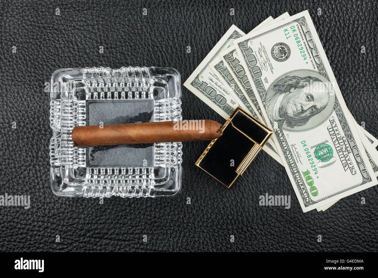 Cigar, ashtray, lighter, money on genuine leather, can be used as