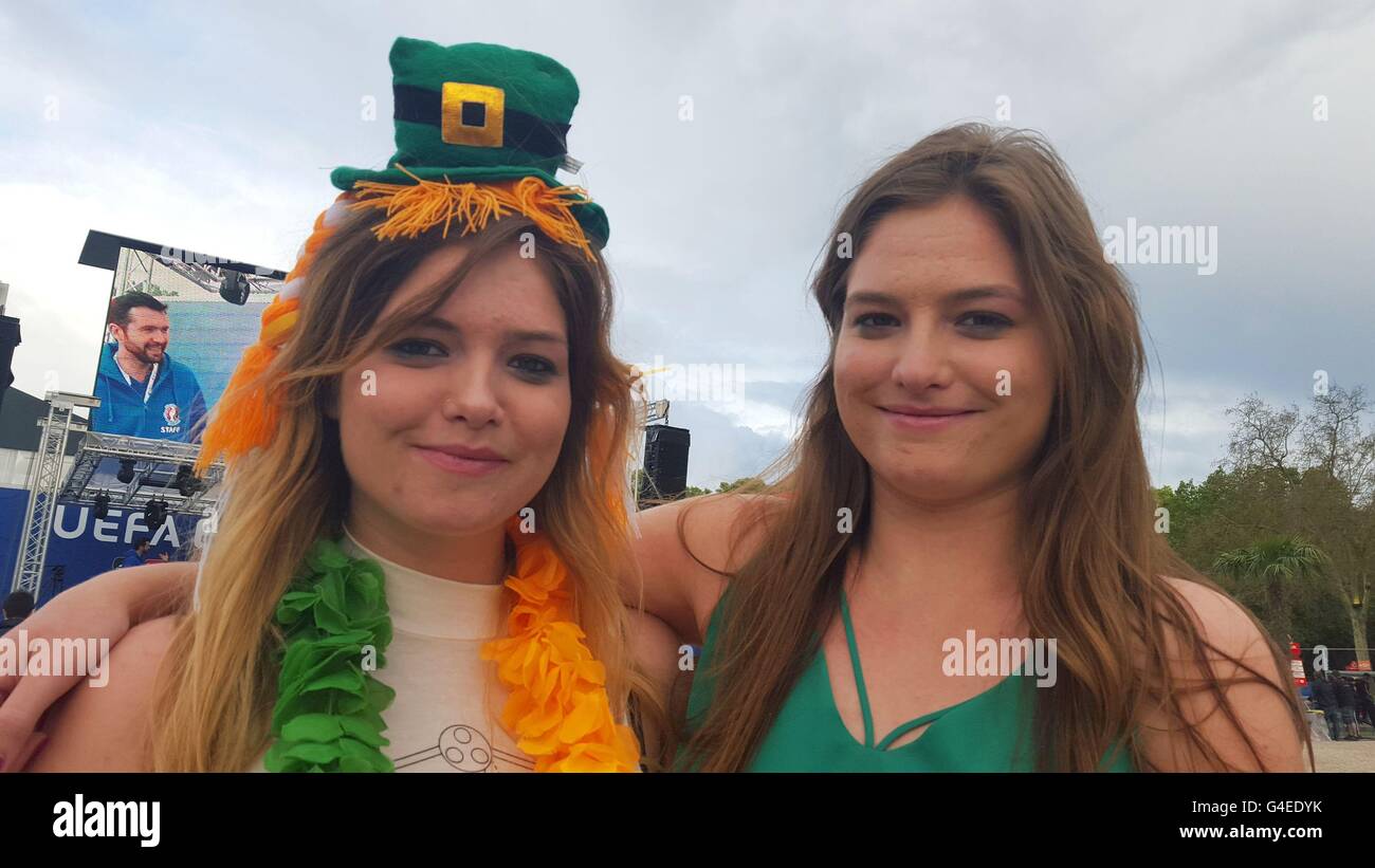 Twin sisters Emma (left) and Kathryn McLoughlin in Bordeaux, France, as the Irish sisters joked about being outnumbered among the boys in green at Euro 2016 where a perk is not having to queue for the toilet. Stock Photo