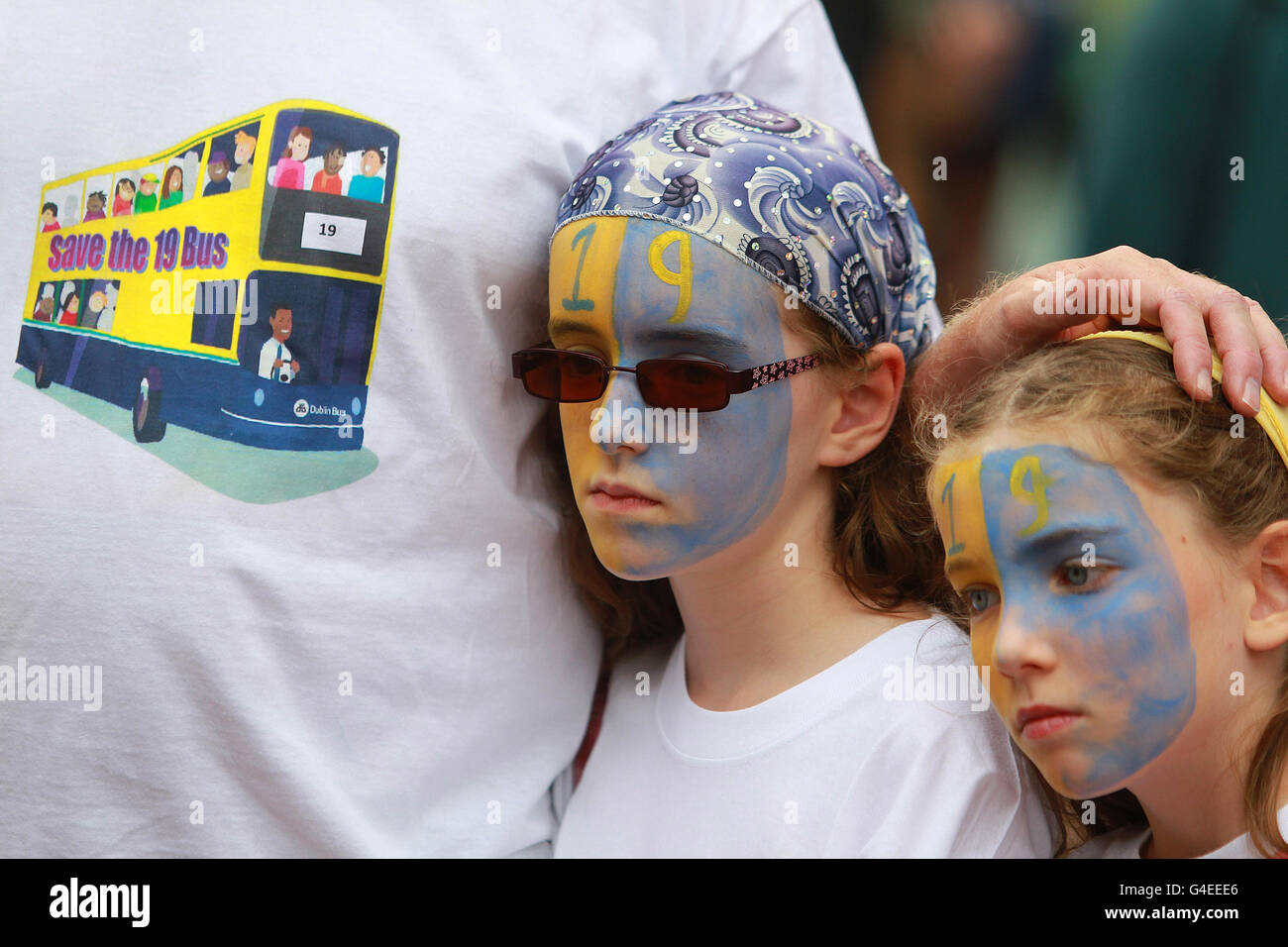 Mark Lawlor with his daughters Sarah and Emily protest against transport cutbacks on Grafton