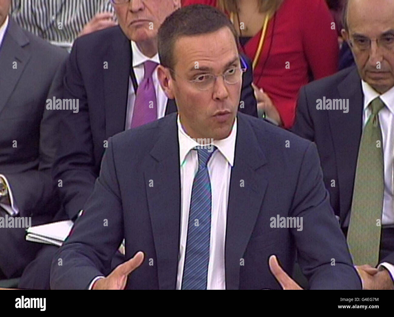 James Murdoch, Deputy Chief Operating Officer and Chairman and Chief Executive Officer, International News Corporation and Rupert Murdoch, Chairman giving evidence to the Culture, Media and Sport Select Committee in the House of Commons in central London on the News of the World phone-hacking scandal. Stock Photo