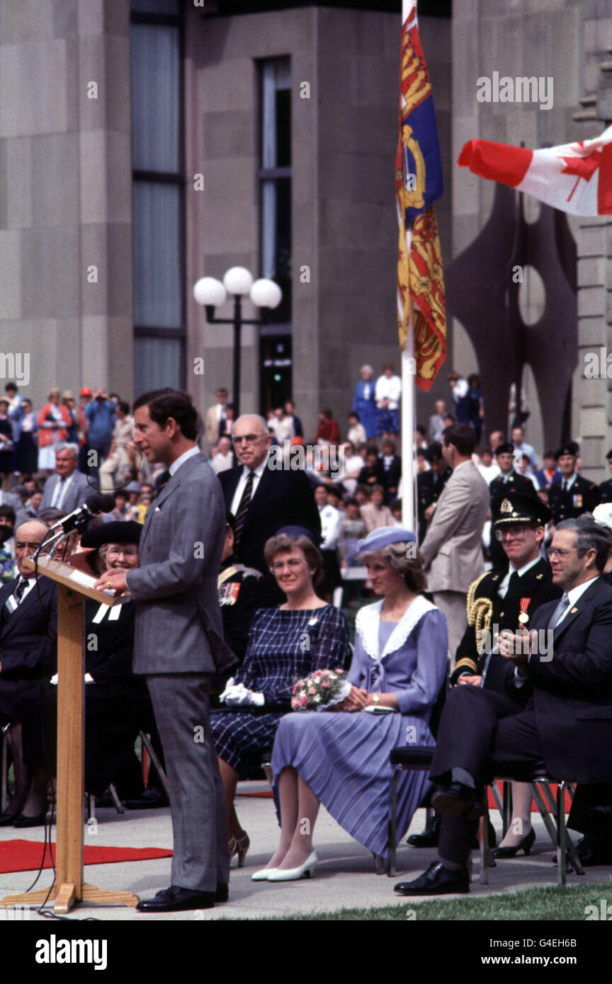 ROYAL TOUR OF CANADA The Prince Of Wales answers welcoming speeches on his arrival in Charlottetown with his wife. She is seated between Prince Edward Island Premier Mr James Lee and his wife Stock Photo