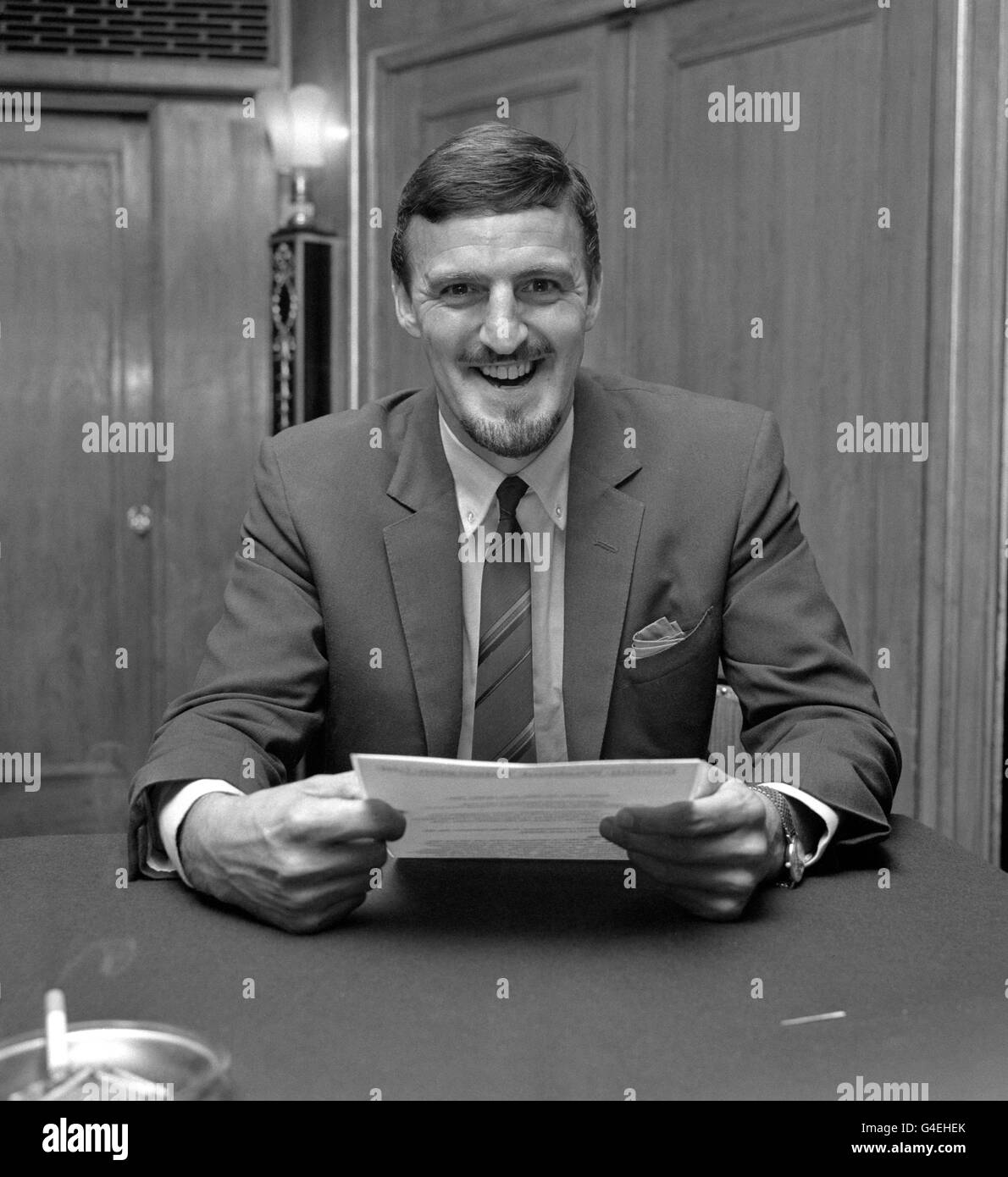 Former Coventry City Manager and footballer Jimmy Hill at a press conference to announce him becoming the head of London Weekend Television Limited's Sports Unit. Balham born Hill (39) began his football career as an amateur with Reading and signed as a professional with Brentford before joining Fulham. He became chairman of the Professional Footballers' Association in 1956 and successfully negotiated a new deal for the players which culminated in the abolition of the maximum wage in 1960. He became Coventry City manager in 1961 and led the club from the third to the first Division in five Stock Photo