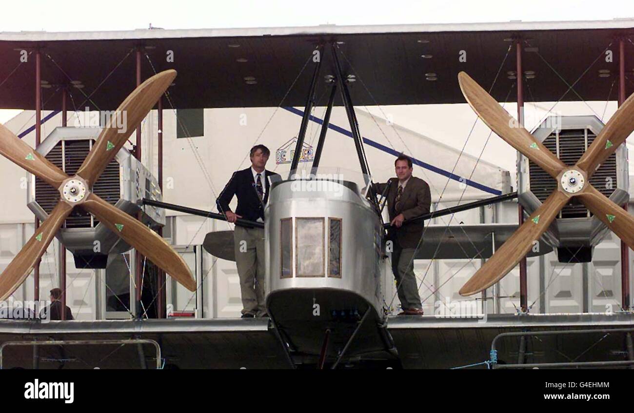 Pilots John LaNoue (right) and Mark Rebholz with the replica version of a Vickers Vimy bomber plane, which is set to re-enact an historic Britain to South Africa flight. The Vimy, called the Silver Queen, has successfully been put through its paces at the Farnborough Air Show. The plane will now leave Brooklands airfield in Surrey on October 1 on a six-week flight to Cape Town. Photo Tim Ockenden /PA. EDI See PA Story AIR Vimy. Stock Photo