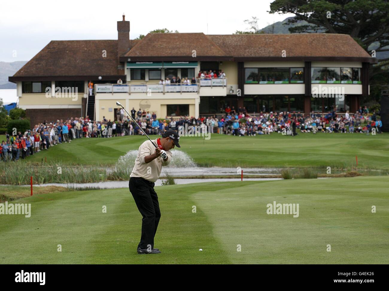 India's Jeev Milkha Singh plays towards the clubhouse during The first round of The Irish Open Stock Photo