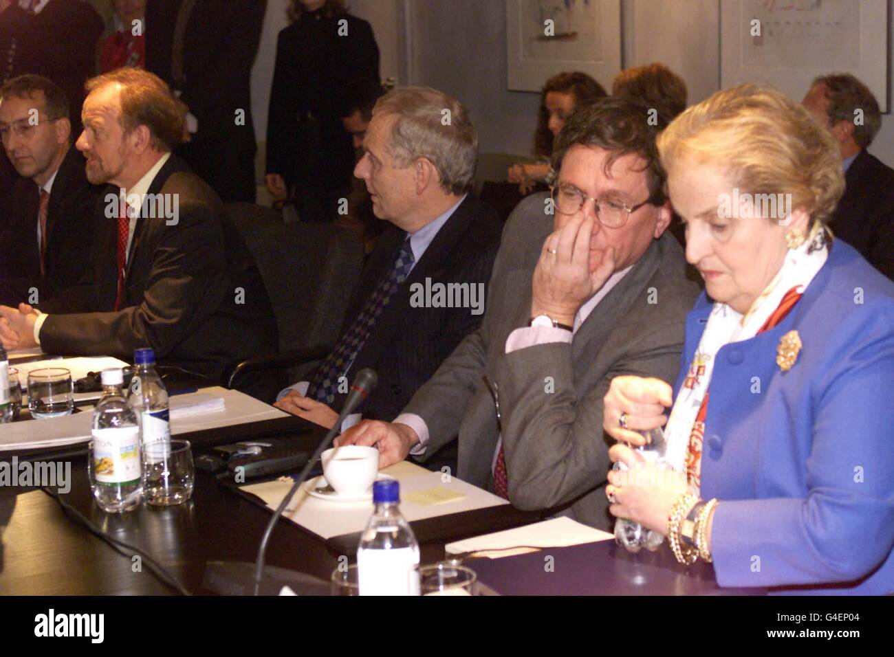 US Secretary of State Madeline Albright, right, listens to US Special Envoy Richard Holdbrook, while Emyr Parry-Jones, Political Director of Britain's Foreign Office, sits alongside and Britain's Foreign Secretary Robin Cook, left, opens the meeting of the Contact Group on Kosovo at London's Heathrow Airport, Thursday October 8, 1998. The group of six foreign ministers from the US, Britain, Russia, Germany, France and Italy met to discuss the crisis in Kosovo, and the possibility of NATO air strikes against Serb forces. (AP Photo/Louisa Buller/POOL) (EDI) Stock Photo