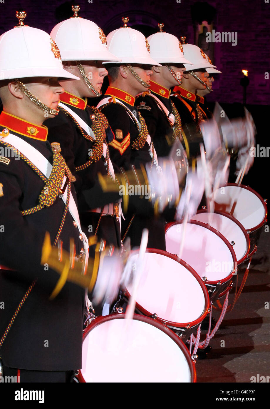 The Massed Bands of Her Majesty's Royal Marines performing during the Edinburgh Military Tattoo full dress rehearsal at Edinburgh Castle. Stock Photo