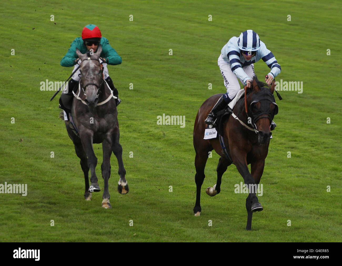Keys ridden by Jamie Spencer wins ahead of second placed Colour Vision ridden by Silverstre De Sousa during The John Guest Brown Jack Stakes during the Betfair Weekend at Ascot Racecourse, Ascot. Stock Photo
