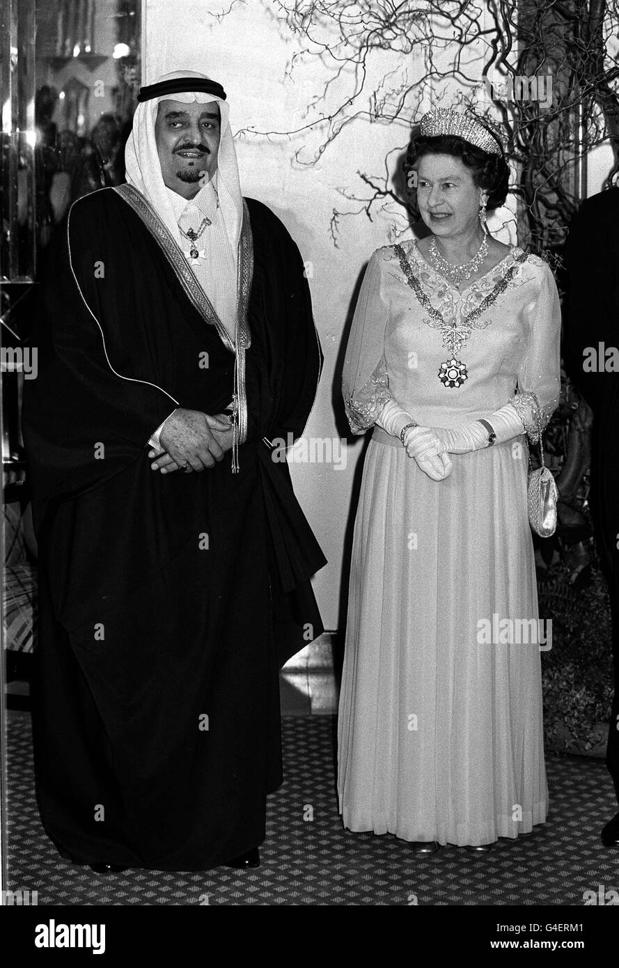 Queen Elizabeth II is greeted by King Fahd of Saudi Arabia at Claridge's Hotel where he gave a banquet. Stock Photo