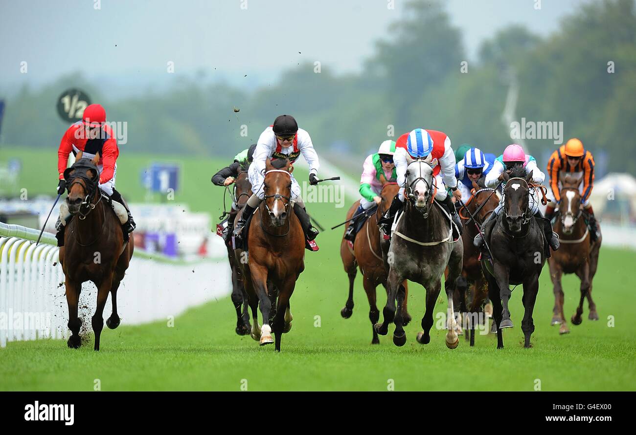 Horse Racing - 2011 Glorious Goodwood Festival - Glorious Totesport Mile Day - Goodwood Racecourse. Drunken Sailor ridden by Kieren Fallon (left) comes home to win the Coutts Glorious Stakes Stock Photo