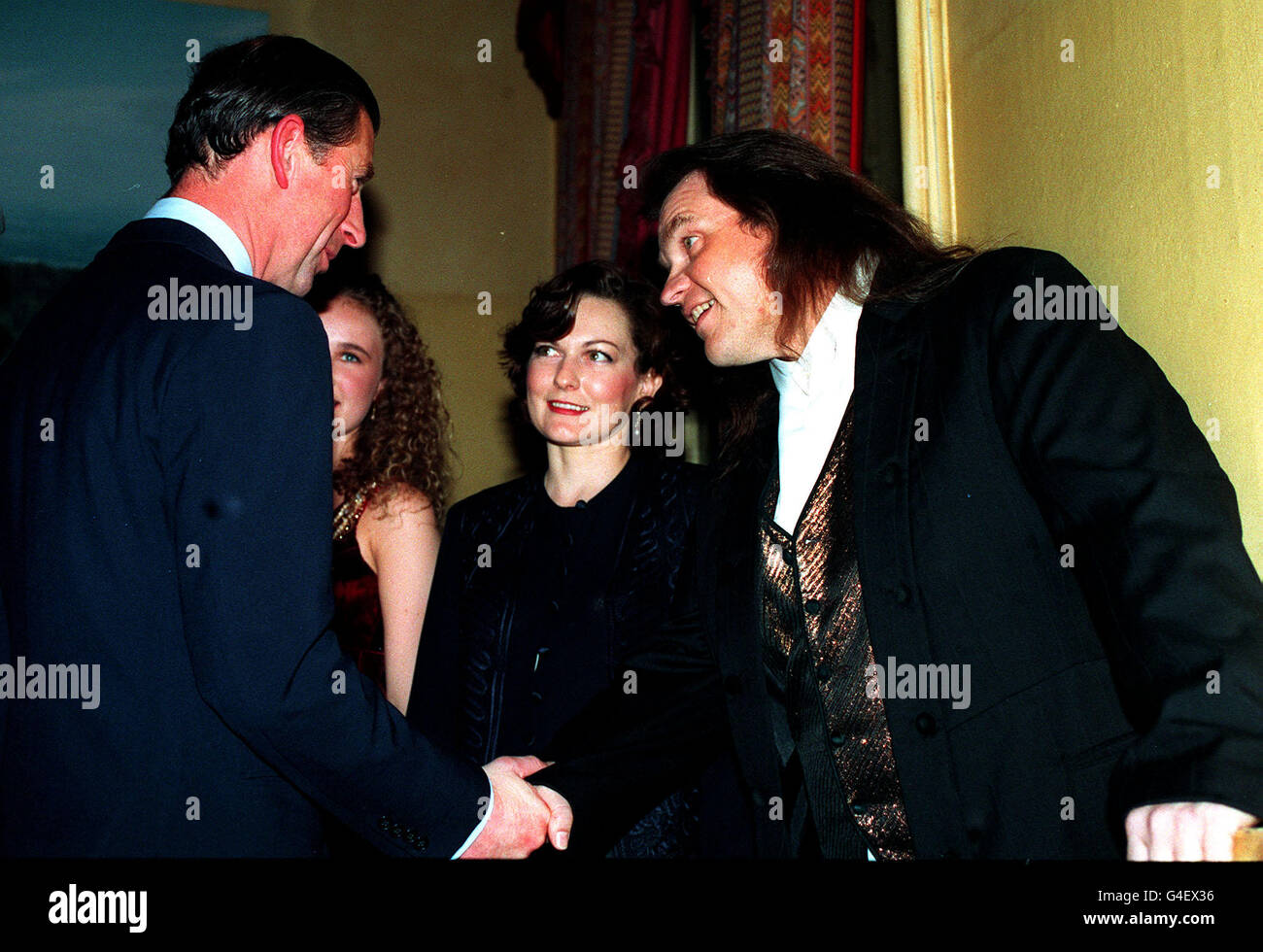 PA NEWS 17/11/94 THE PRINCE OF WALES SHAKES HANDS WITH SINGER Meat Loaf
