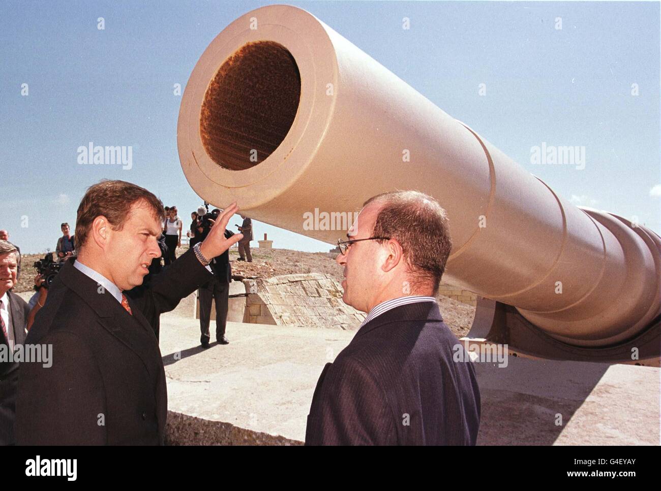 The Duke of York with guide Mario Farrugia, inspects the 100 ton gun at Fort Rinella on the coast near to Valletta, Malta this afternoon. The Duke is on a 2 day visit to the island. PHOTOGRAPH BY JOHN STILLWELL/PA. Stock Photo