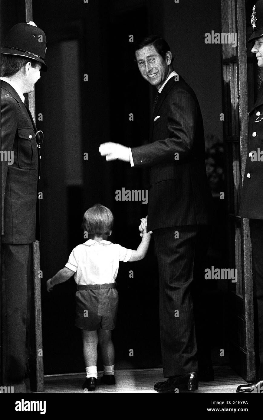 PA News 16/9/84 Prince Charles and his two-year-old son Prince William enter the private Lindo Wing of St. Mary's Hospital, Paddington, London, to visit the Princess of Wales and the baby she gave birth to the previous day. Stock Photo