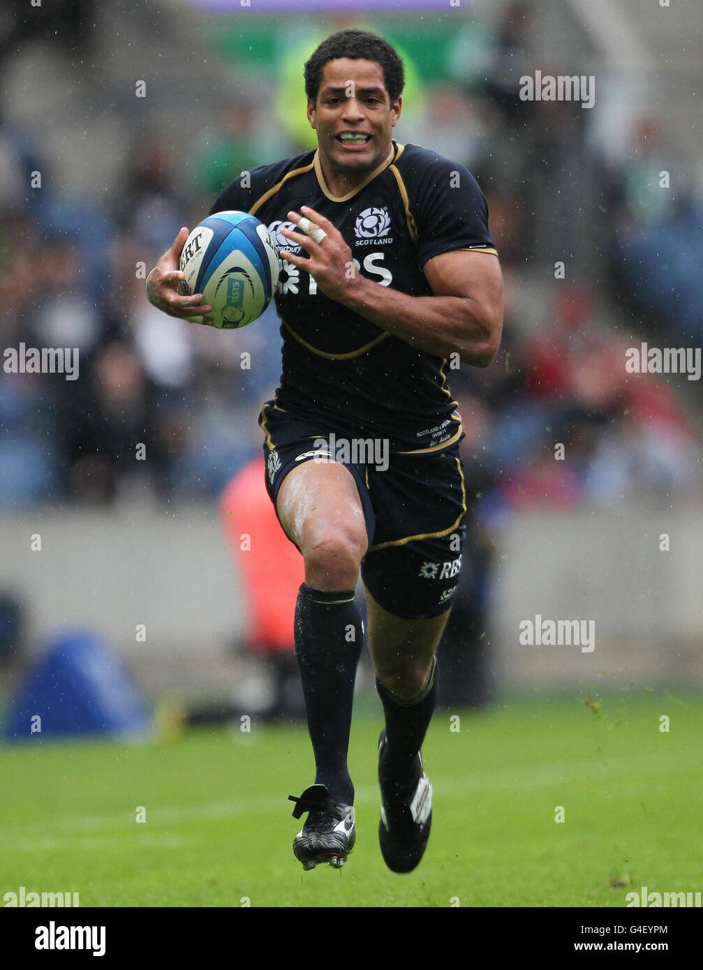 Scotland's Joe Ansbro runs through to score the winning try during the