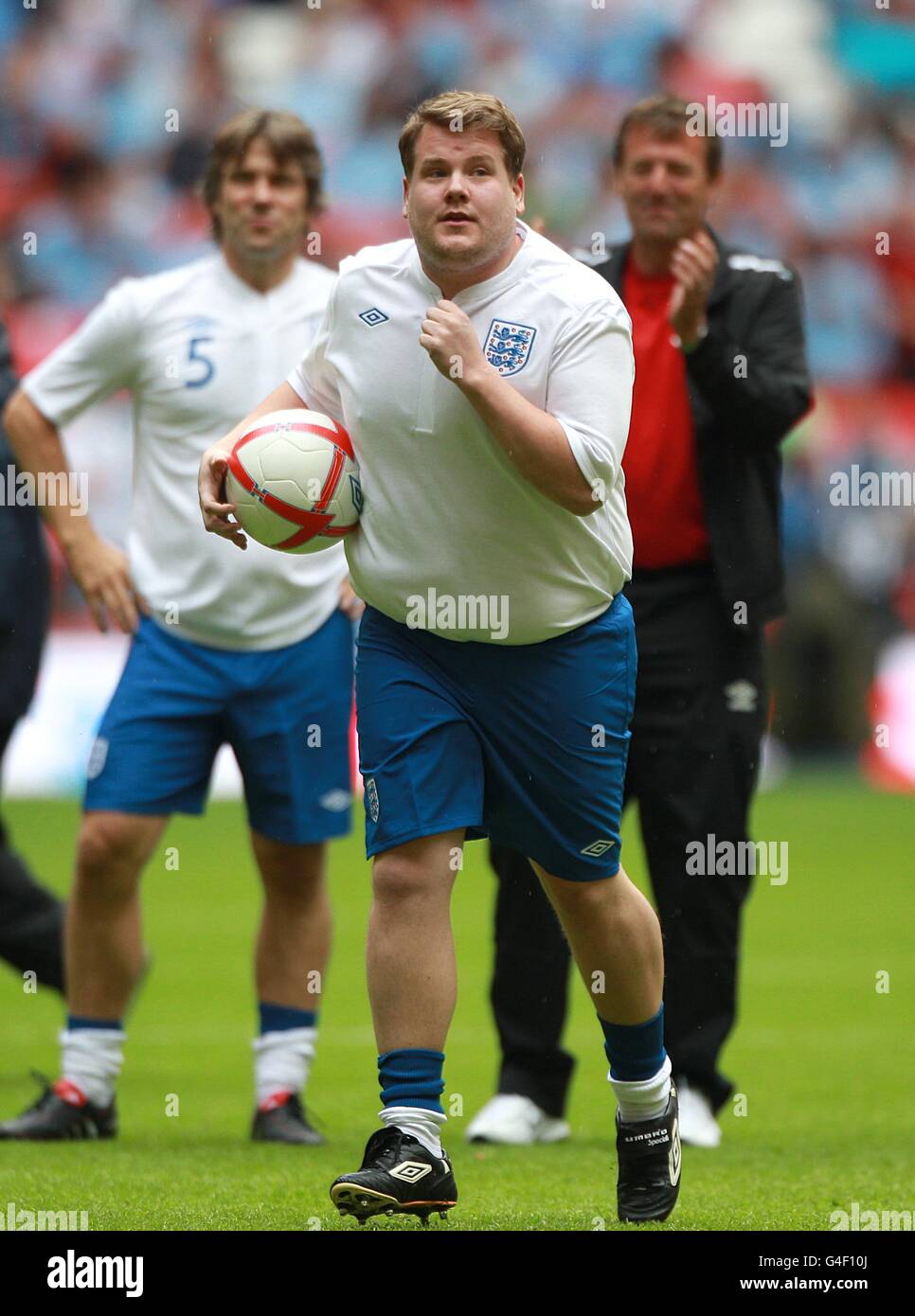 At half time during the penalty shoot out competition hires stock