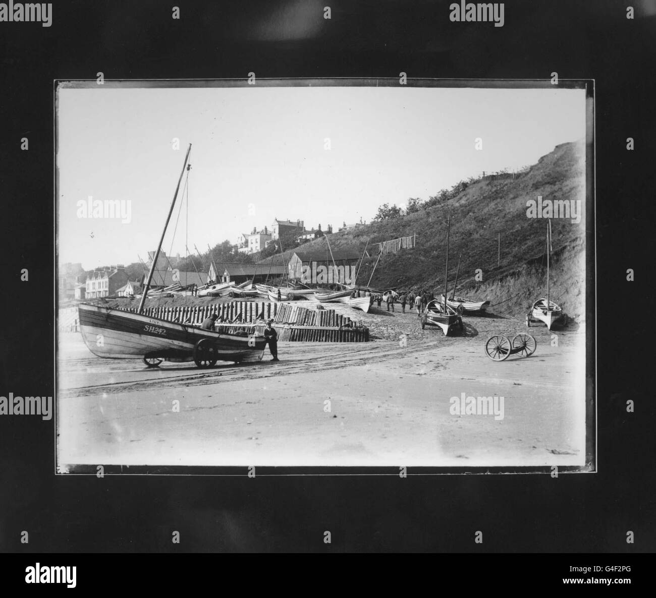 Boats on the foreshore at Filey taken on August 24th 1900 at 9.20 am, the exposure was one twenty fifth of a second - at f16.A treasure trove of Victorian photography, hidden for nearly 100 years has been discovered in a garage in Grimsby. The collection of high quality glass negatives and magic lantern slides, which will be sold with the cameras next week, were shot by Yorkshireman William Wells between 1899 and 1901. PA Photos. See PA story SOCIAL Photos Stock Photo