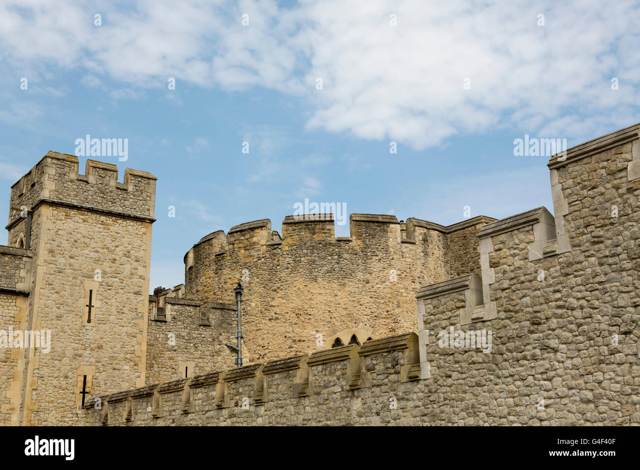 Old Stone castle walls with ramparts and lookouts. Stock Photo