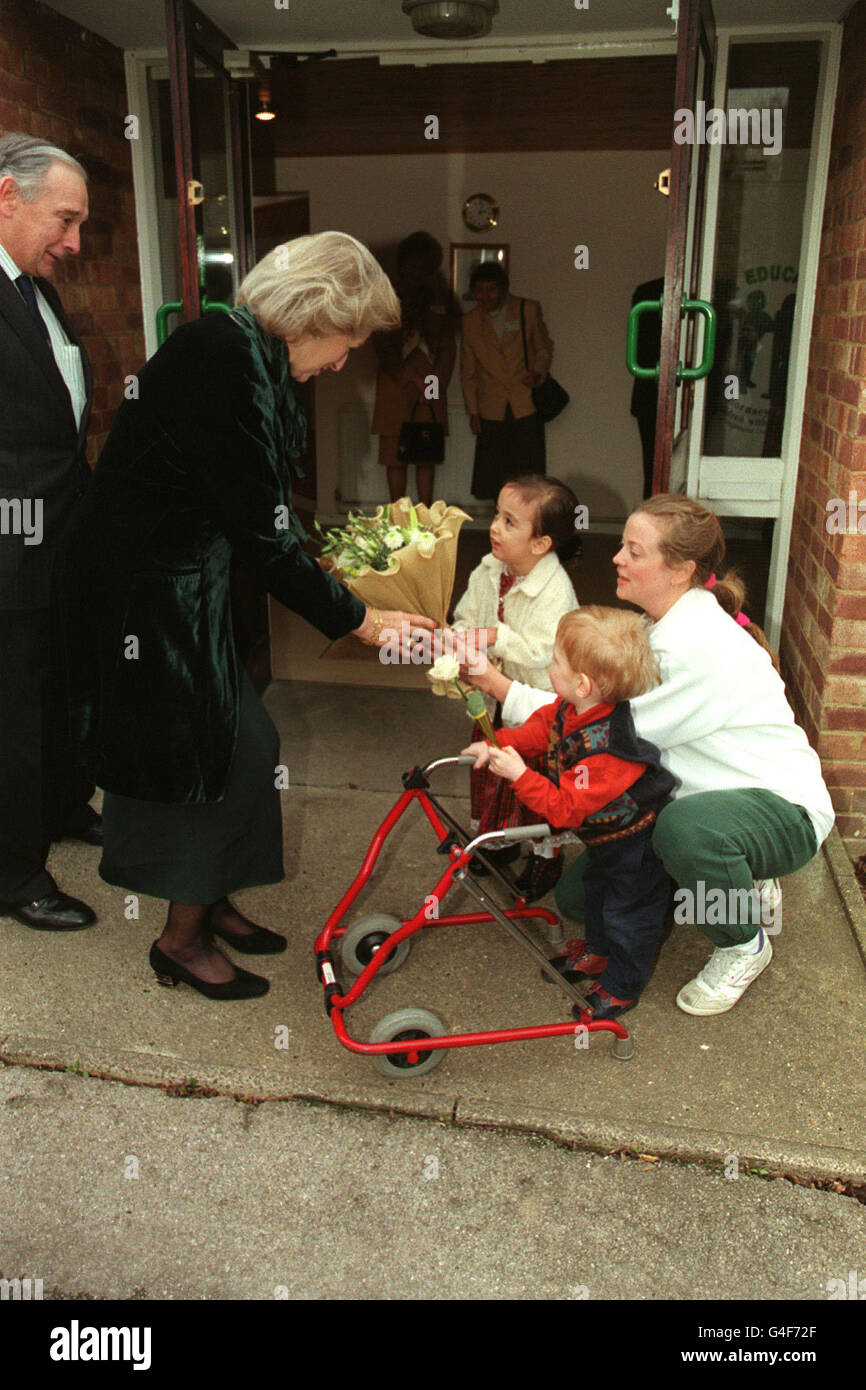 PA NEWS PHOTO 18/11/98 PRINCESS ALEXANDRA IS PRESENTED WITH A BOUQUET BY MELISSA CANAK,FOUR, AND DANIEL SMOUT, TWO AND A HALF, DURING HER VISIT TO THE CONDUCTIVE EDUCATION CENTRE IN MUSWELL HILL, LONDON, TO CELEBRATE ITS TENTH ANNIVERSARY. THE CENTRE PRACTISES THE THE PETO SYSTEM FOR CHILDREN WITH CEREBRAL PALSY. Stock Photo