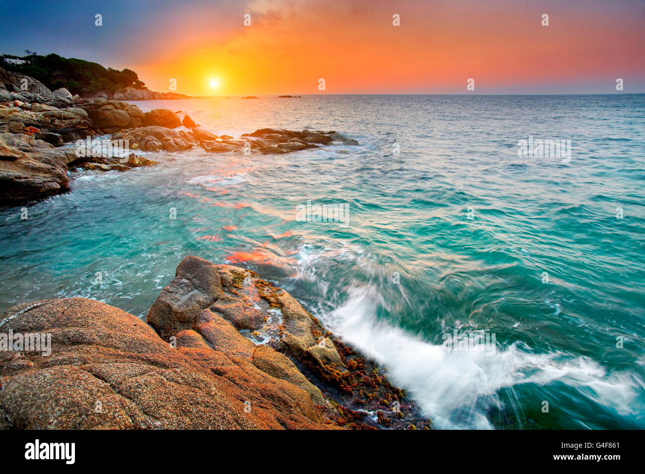 Rock in water sunset sunrise hi-res stock photography and images - Alamy