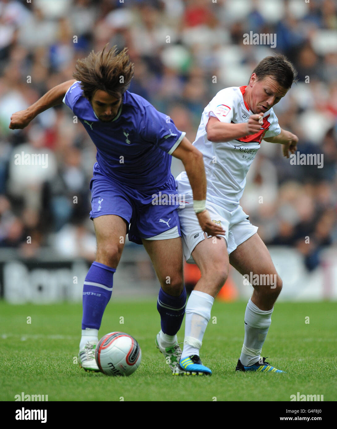 Milton Keynes Dons' Stephen Gleeson and Tottenham Hotspur XI's Niko Kranjcar Stock Photo