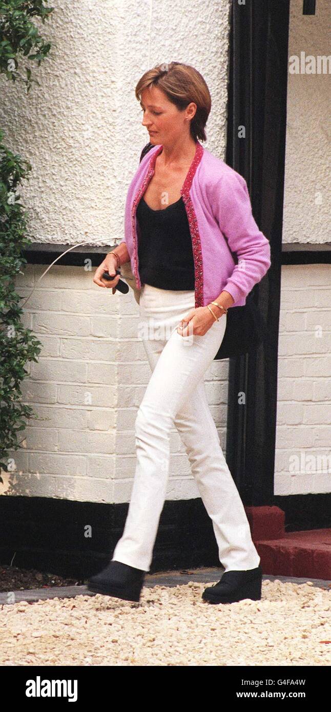 Ali Cockayne leaving the house she shared with former England rugby captain Will Carling today (Friday). Mr Carling has dumped his lover and the mother of his child, 10 month old Henry for the wife of a friend. Carling is reported to have fallen for Lisa Cooke, the estranged wife of ex-rugby international David Cooke. It emerged today that Carling left the 800,000 property at around 9pm last night. Photo by Tony Harris/PA. See PA story SOCIAL Carling. Stock Photo