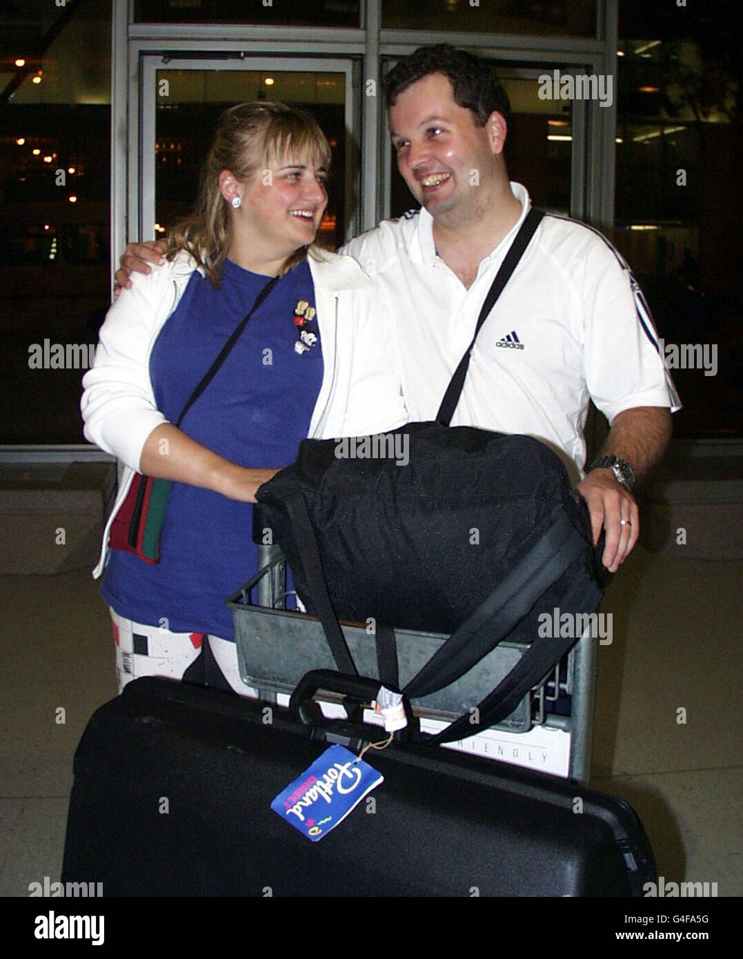 Honeymoon couple Toni Woodhouse and Dean Hawkins from Birmingham, arrive at Manchester Airport from Florida early this morning (Friday) as the full might of Hurricane Georges prepares to hit Florida. Photo by Dave Kendall/PA. See PA story WEATHER Hurricane Stock Photo