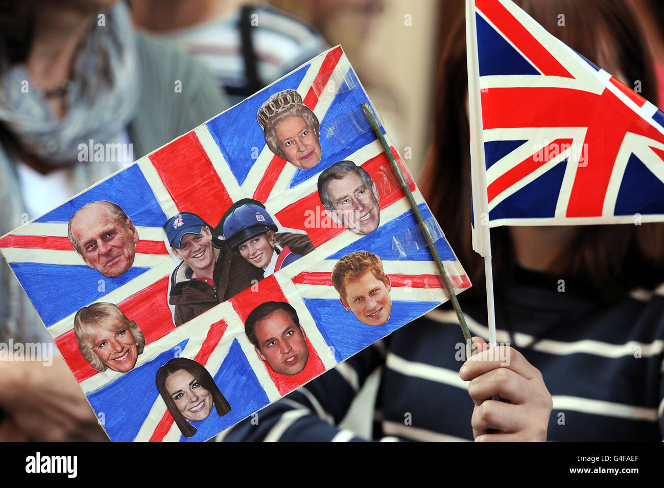 Royal fans gather at the Canongate Kirk, in Edinburgh, as final preparations continue ahead of the wedding of Zara Phillips and Mike Tindall. Stock Photo