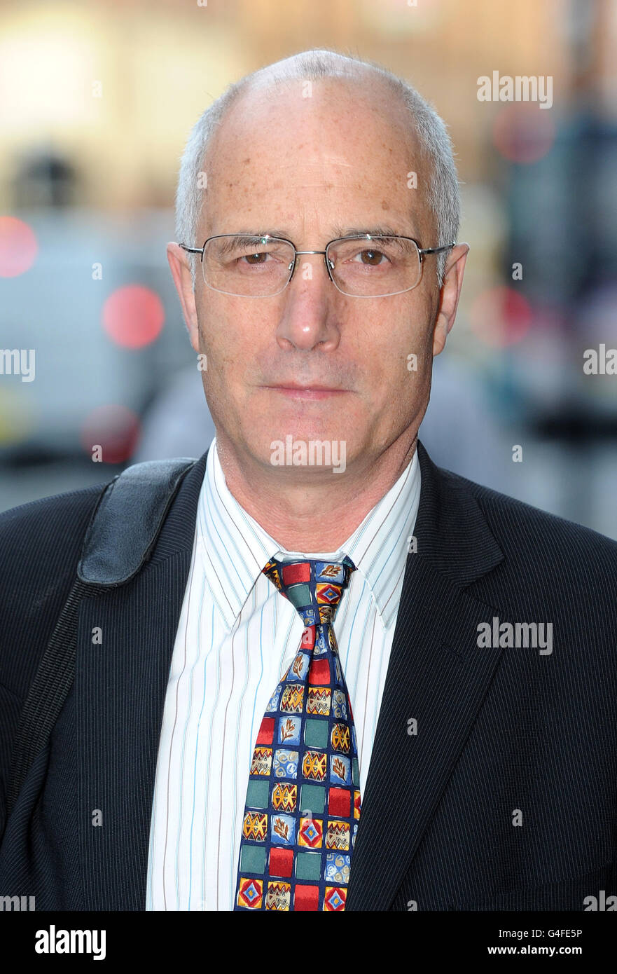 Dr William Bassett arrives at the GMC in Manchester where he is due to give evidence in his fitness to practice hearing. He is accused of misconduct over an overdose of diamorphine he gave to a terminally ill lung cancer sufferer. Stock Photo