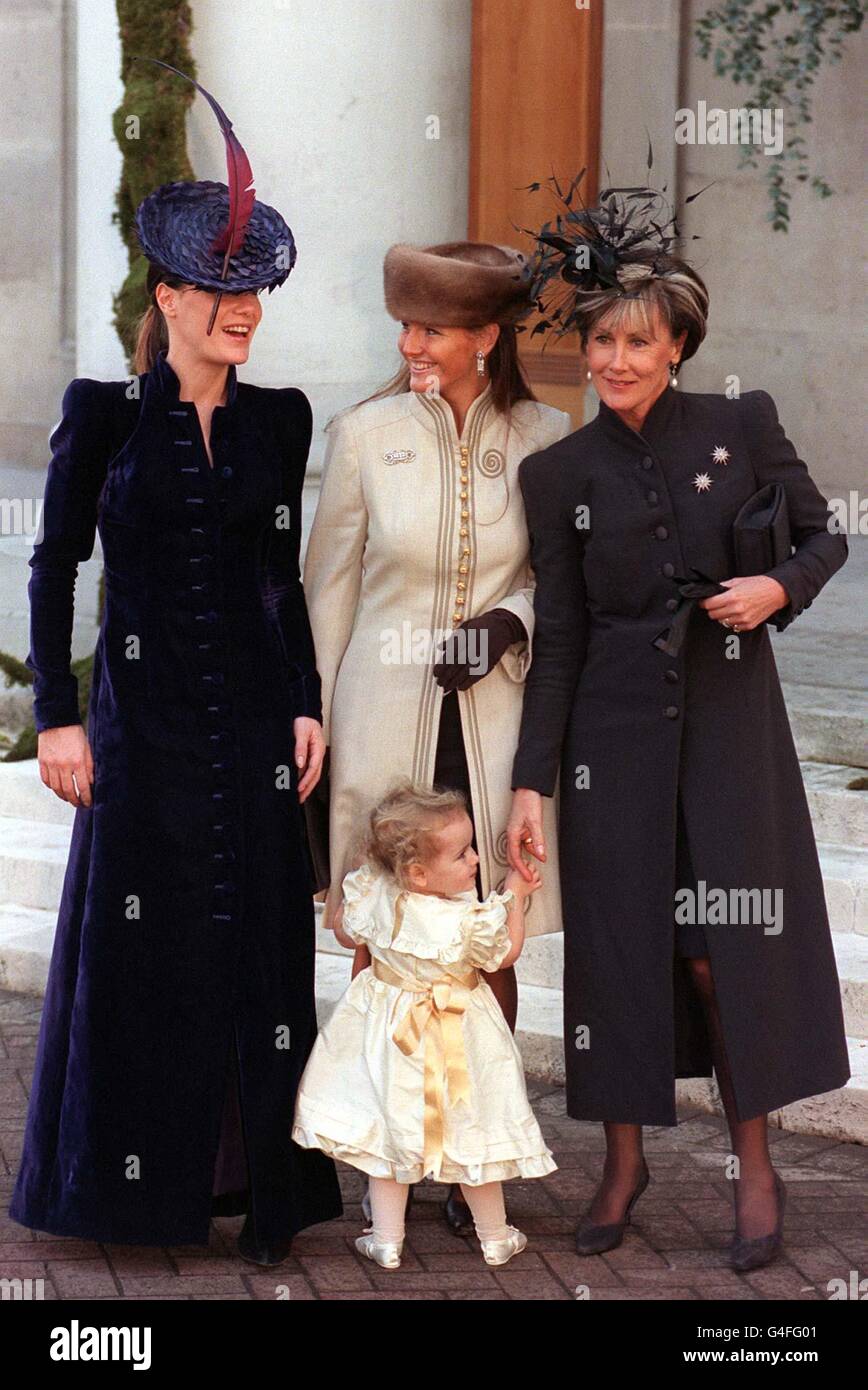 Tara Palmer-Tomkinson (left) with her mother Patti (right), both wearing outifts designed by Anthony Price, and sister Sarah at the marriage of socialite Santa Palmer-Tomkinson and writer Simon Sebag-Montefiore at a Jewish synagogue in St John's Wood. * North London. Stock Photo