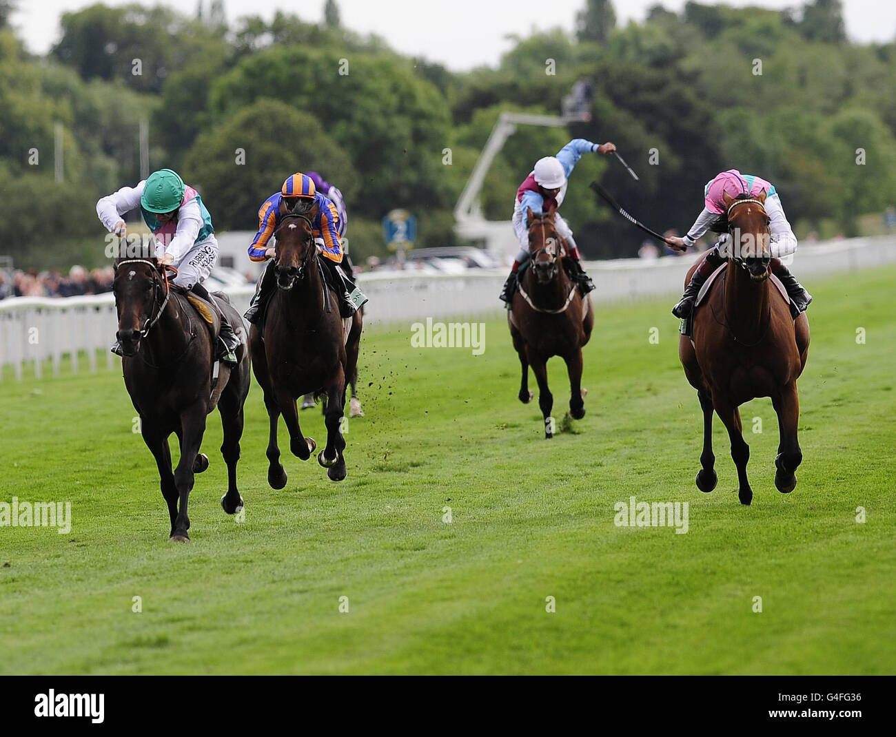 Twice Over and jockey Ian Mongan (left) beat his stablemate Midday and jockey Tom Queally (right) to win the Juddmonte International Stakes during the Ebor Festival 2011 at York Racecourse. Stock Photo