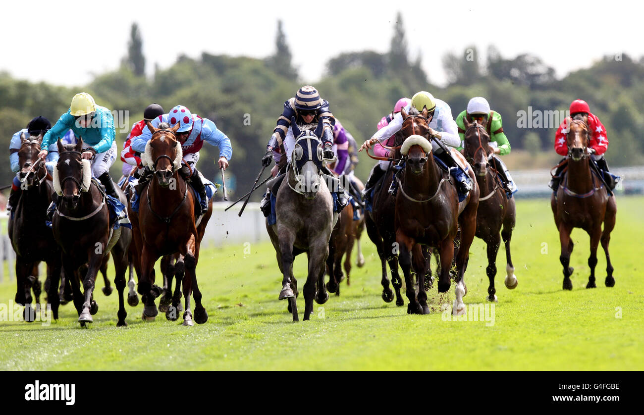 Horse Racing - Ebor Festival 2011 - Juddmonte International - York Racecourse. Secret Asset (grey horse) ridden by George Baker comes home to win The Symphony Group Stakes Stock Photo