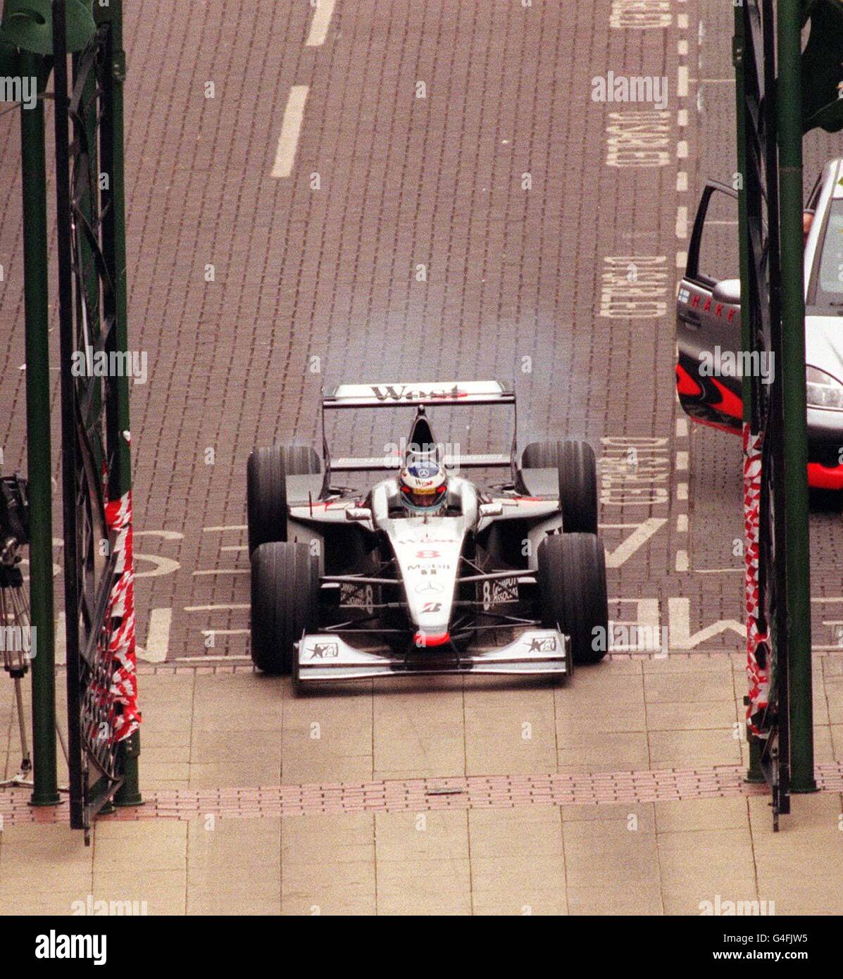 World F1 champion Mika Hakkinen drives his West/McLaren F1 car on a lap