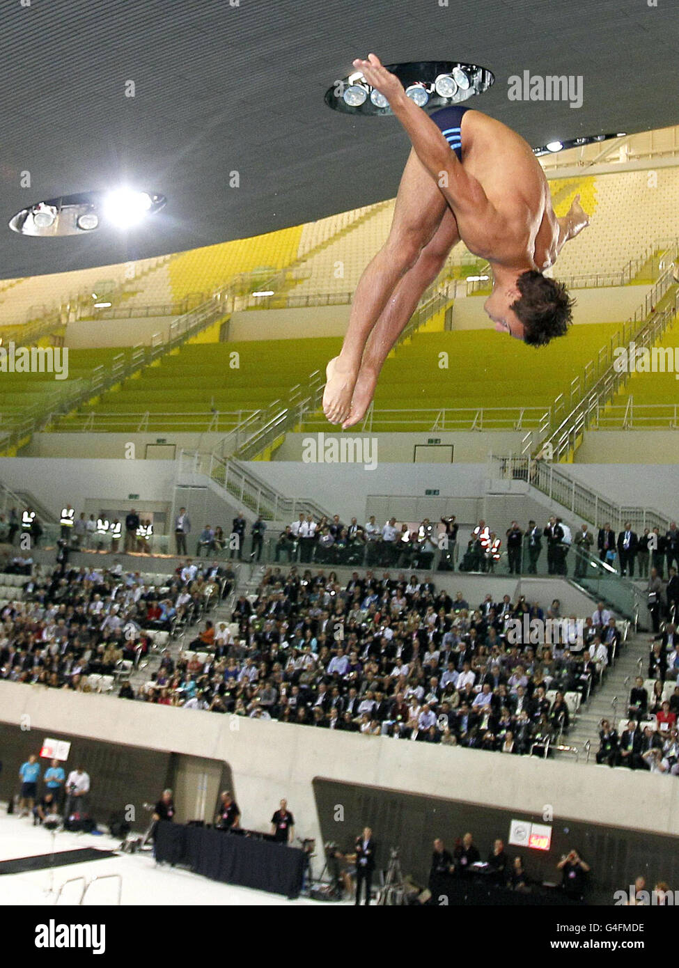 British Olympic diver Tom Daley performs a dive into the new aquatic