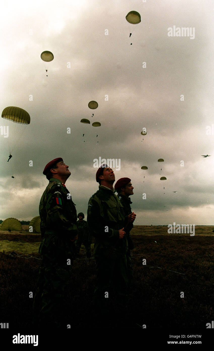 PA NEWS PHOTO 17/9/94 THE PRINCE OF WALES (CENTRE) WATCHES AS BRITISH PARATROOPERS FALL DURING THE DROP ON GINKEL HEATH TO MARK THE 50TH ANNIVERSARY OF THE BATTLE OF ARNHEIM. SEVERAL WERE INJURED AND A PLANNED JUMP BY VERTERANS OF THE BATTLE DIDNOT TAKE PLACE. Stock Photo