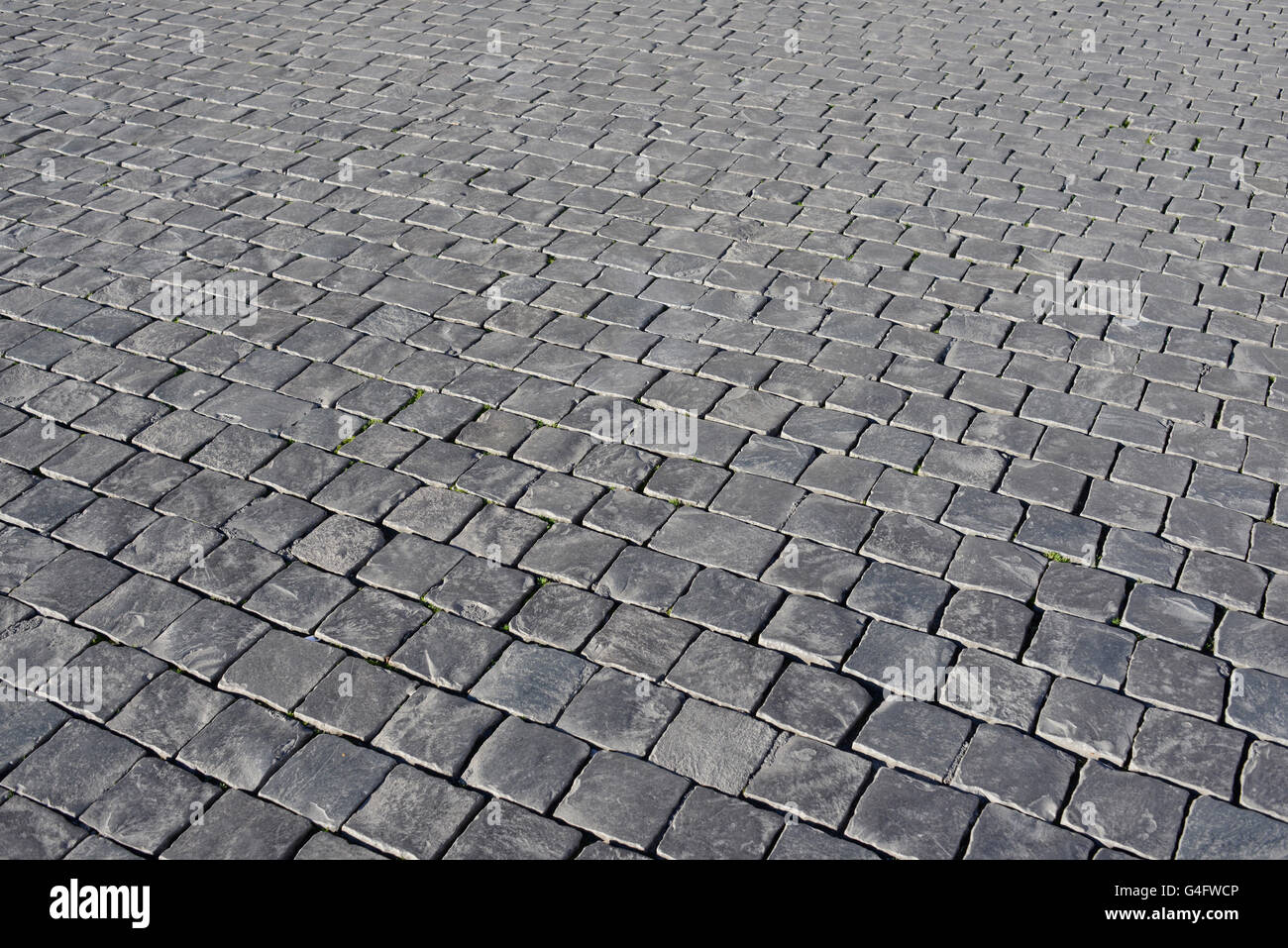 Grey stone cobblestone background Stock Photo - Alamy