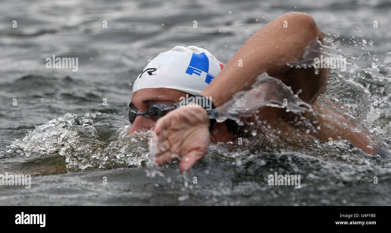 Julien Sauvage during the mens race during the Marathon Swimming Olympic Games Test Event in Hyde Park, London. Stock Photo