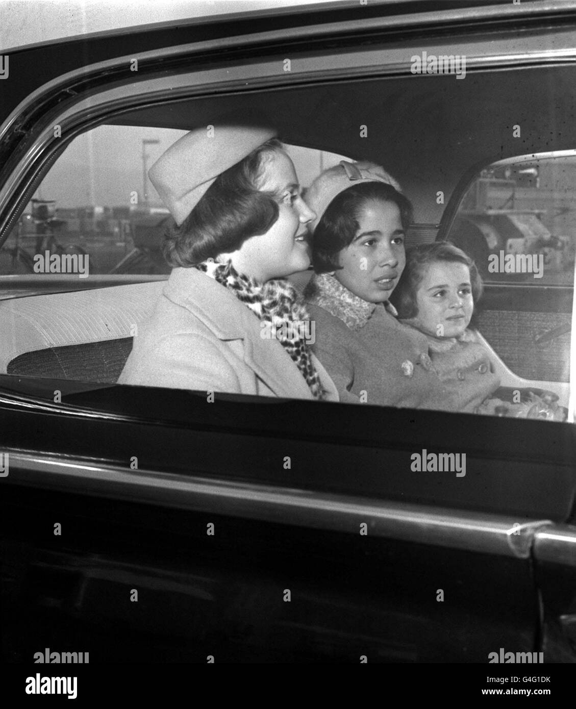 PRINCESS MUNA AL HUSSEIN (FORMERLY TONI GARDINER), IPSWICH-BORN WIFE OF  KING HUSSEIN OF JORDAN, DRIVES FROM LONDON AIRPORT WITH PRINCESS ALIA  (RIGHT) HER HUSBAND'S DAUGHTER BY HIS FIRST WIFE, EX-QUEEN DINA AND