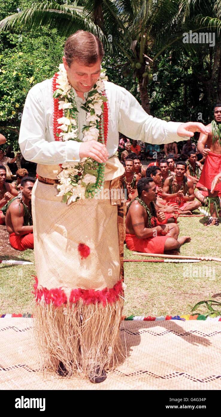 The Duke of York checks his dancing, as he joined in a traditional dance ceremony in Apia, the capital of Samoa, after being made a chief today (thursday). PHOTO BY JOHN STILLWELL/PA. Stock Photo