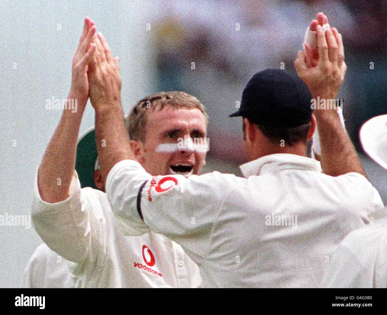 England's Dominic Cork celebrates the dismissal of Australian captain