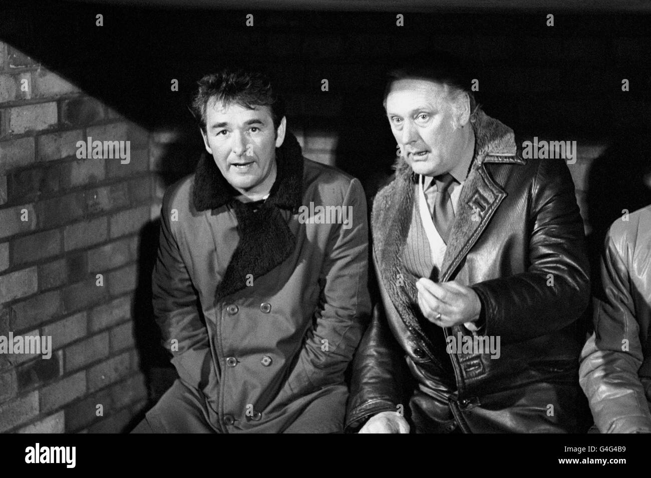Nottingham Forest's manager Brian Clough (left), and assistant manager Peter Taylor discussing the FA Cup fifth round replay against Queen's Park Rangers, at the City Ground. Stock Photo