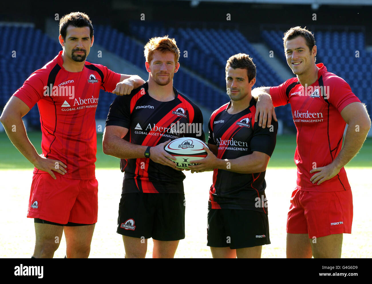 (left-right) Edinburgh Rugby's Sean Cox,Roddy Grant,Chris Leck and Tim Visser launch their new home and away kits for season 2011/2012 during the kit launch at Murrayfield Stadium, Edinburgh. Stock Photo