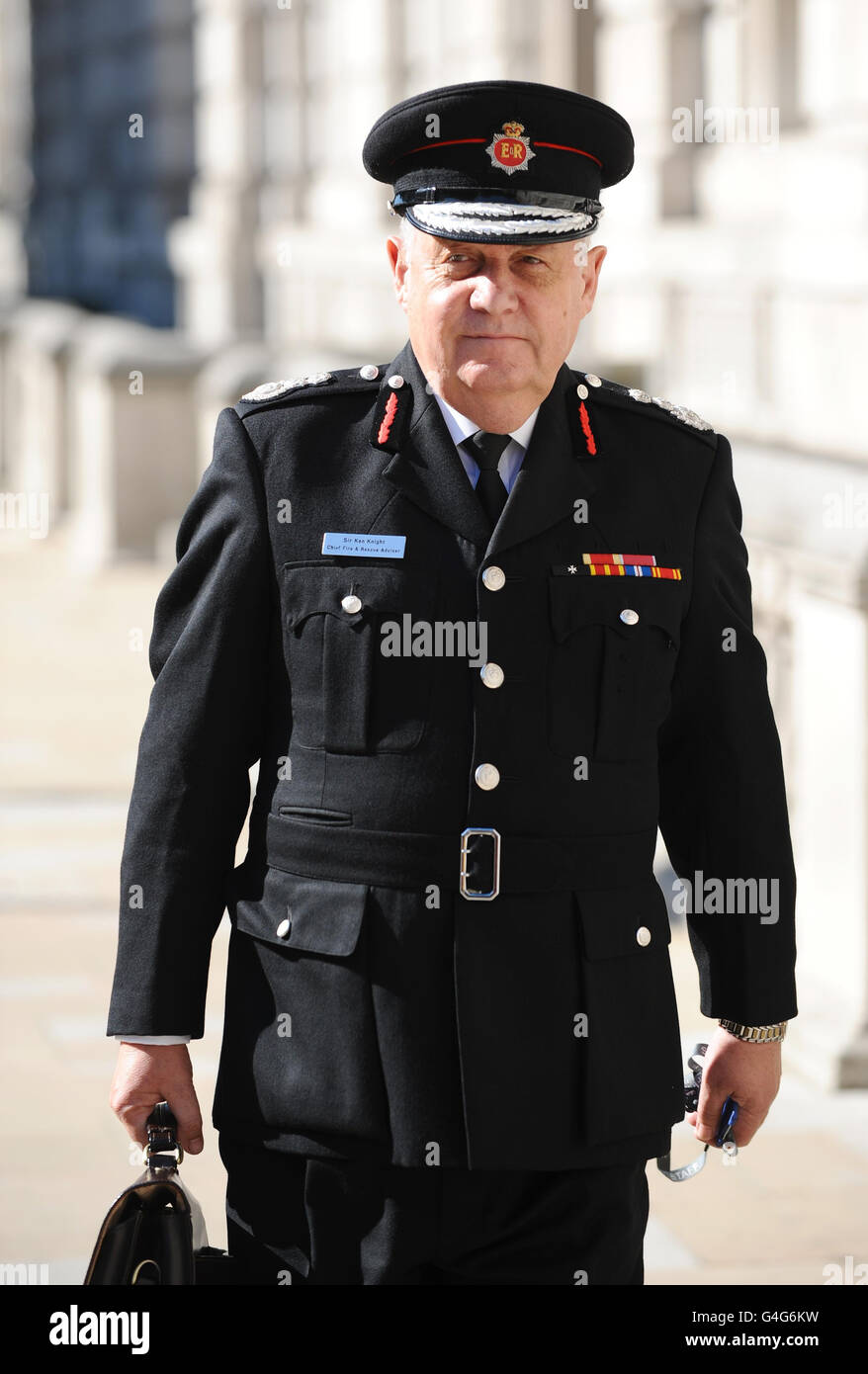 Chief Fire and Rescue Advisor Sir Ken Knight arrives for a meeting of Cobra, at the Cabinet Office, Westminster, London. Stock Photo