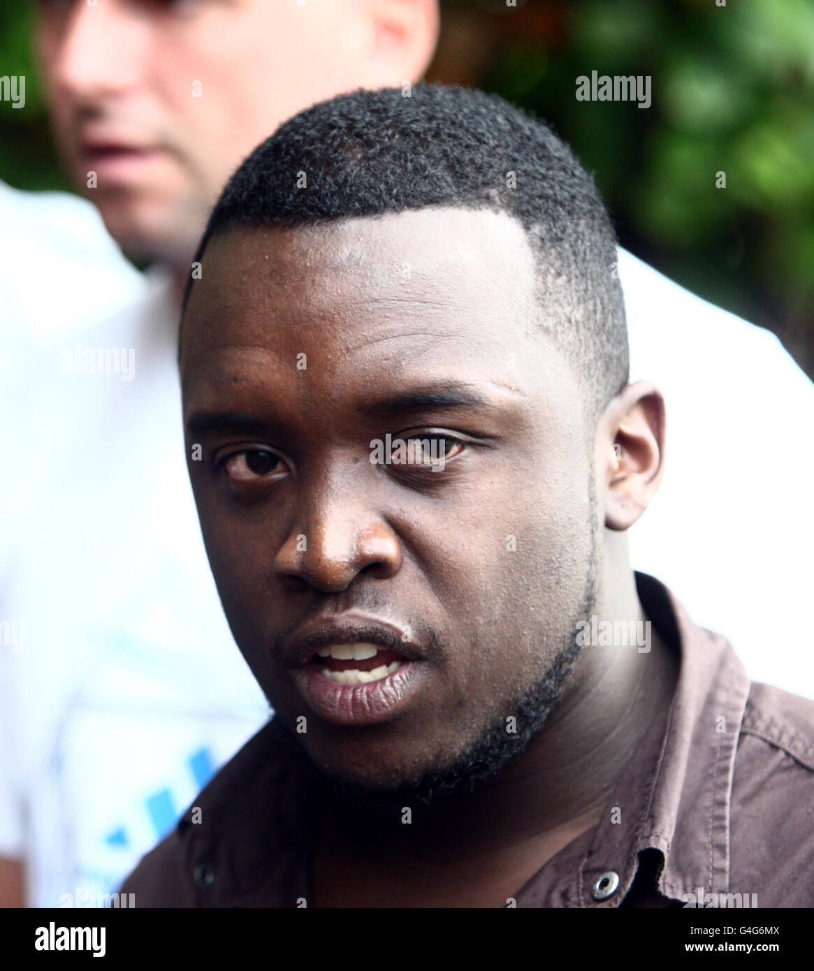 Bryan Ogesa, 24, talks to media outside Victoria Crescent in St Helier, Jersey after 3 children and 2 adults were stabbed to death. Mr Ogesa, a resident in the same block of Bryan Ogesa, 24, talks to media outside Victoria Crescent in St Helier, Jersey after 3 children and 2 adults were stabbed to death. Mr Ogesa, a resident in the same block of
