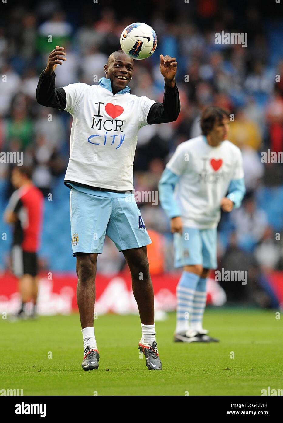 Manchester City s Mario Balotelli wears an I Love MCR t shirt on