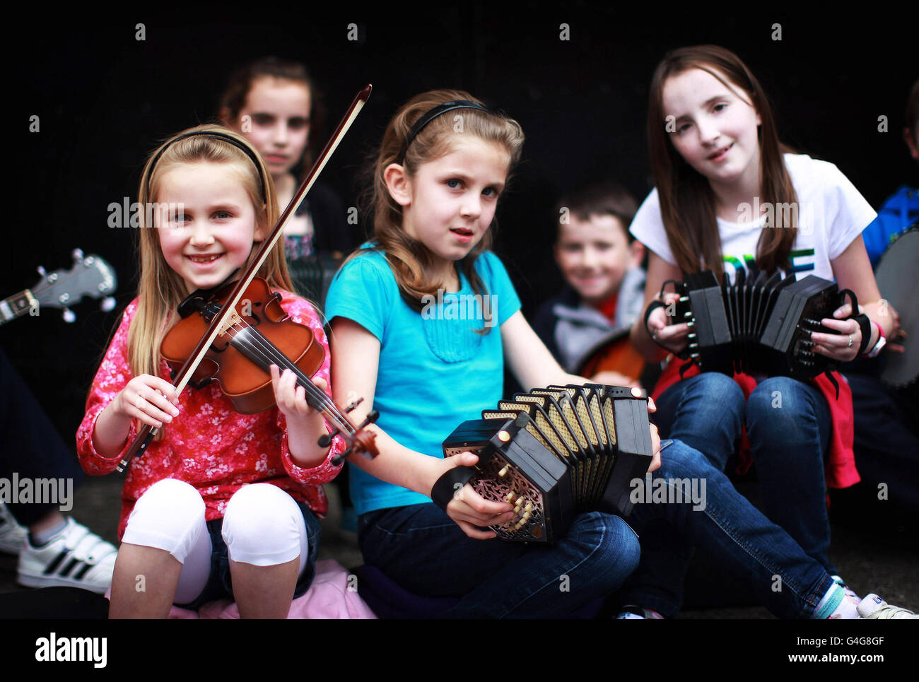 Children play traditional Irish music on the street in Cavan town
