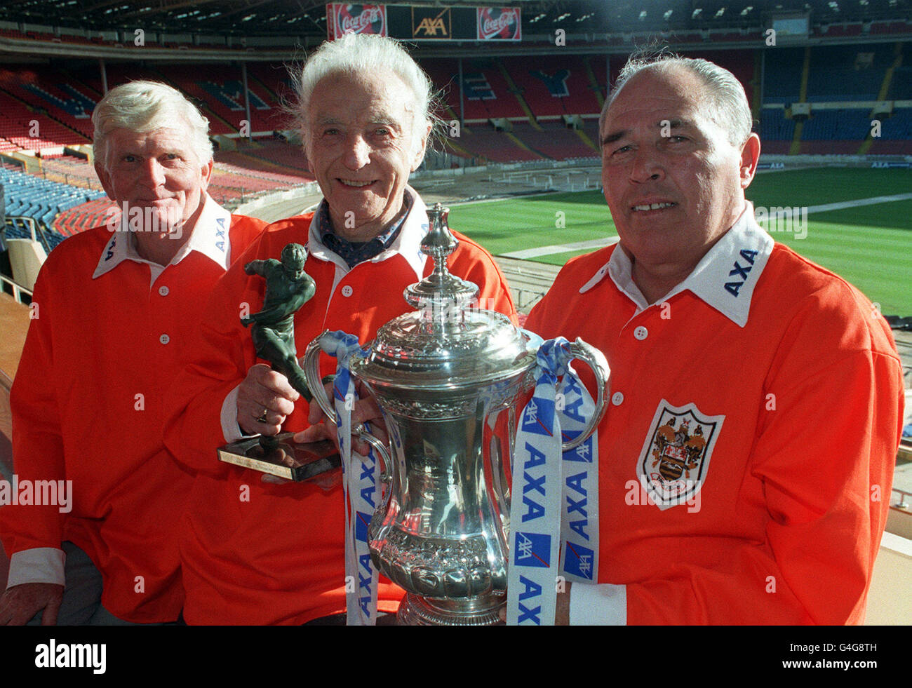 Presented him by fa cup sponsors axa hi-res stock photography and images -  Alamy