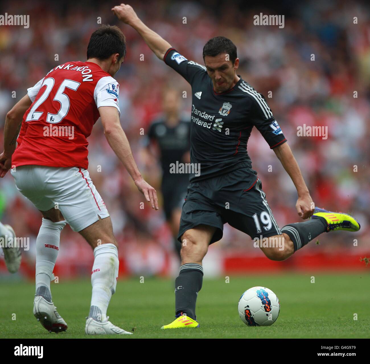 Soccer - Barclays Premier League - Arsenal v Liverpool - Emirates Stadium. Liverpool's Stewart Downing shoots Stock Photo