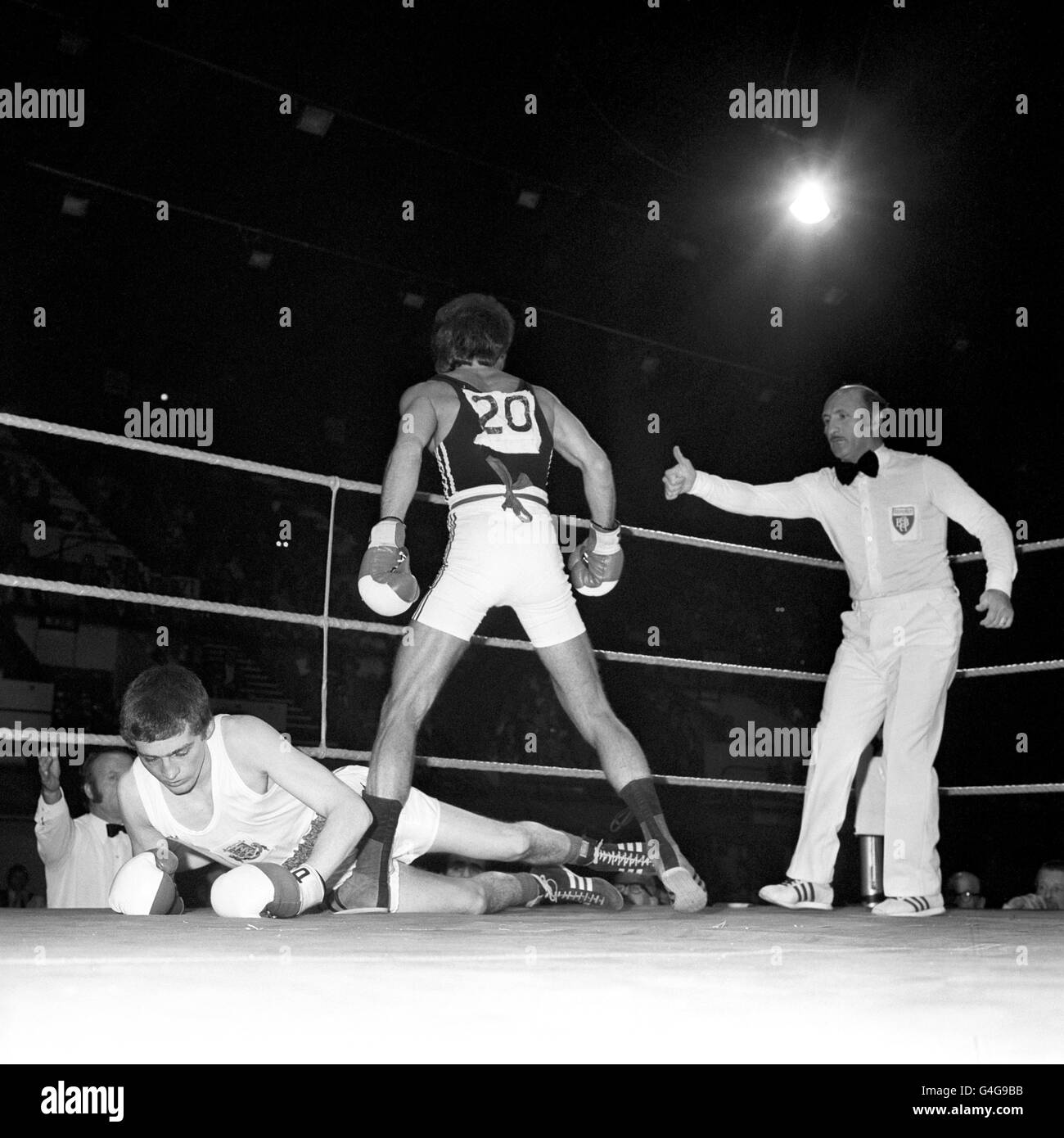 Rene Weller looks over the floored Gary Felvus. Weller went on to win the fight Stock Photo